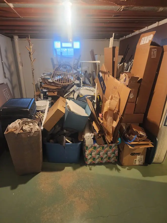 Roll-off dumpster container at job site for 15 Yard Dumpster Rental in Troy